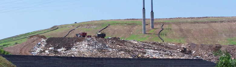 Reinforced soil structure for landfills with StrataSlope™ System